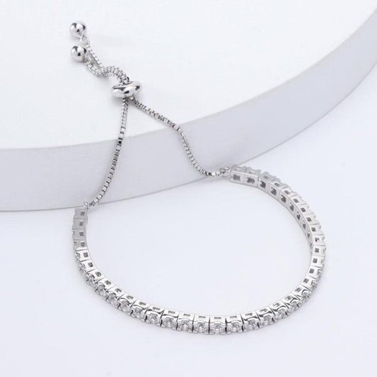 tennis bracelet featuring a row of round-cut diamonds