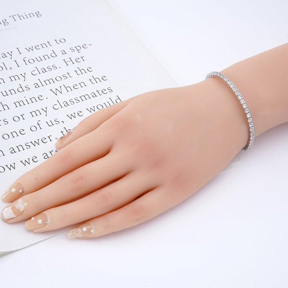 tennis bracelet featuring a row of round-cut diamonds